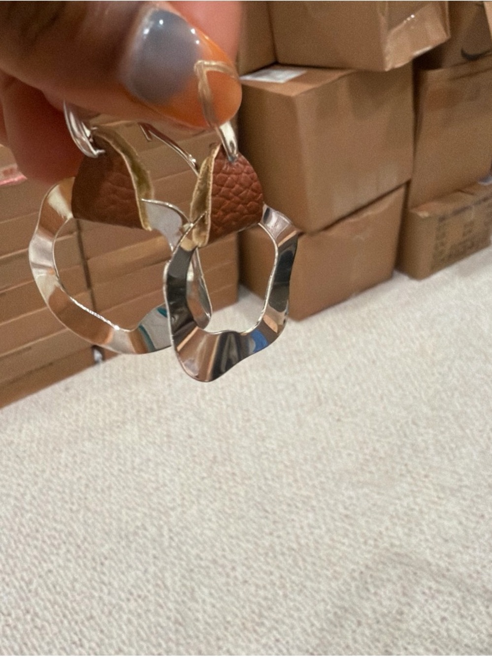 Silver Wavy Hoop Earrings with Brown Leather Accent